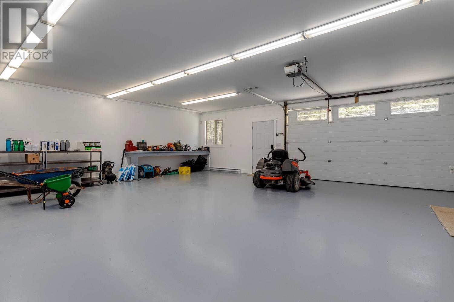 8566 Eacrett Road, Dry Gulch, BC - Indoor Photo Showing Garage