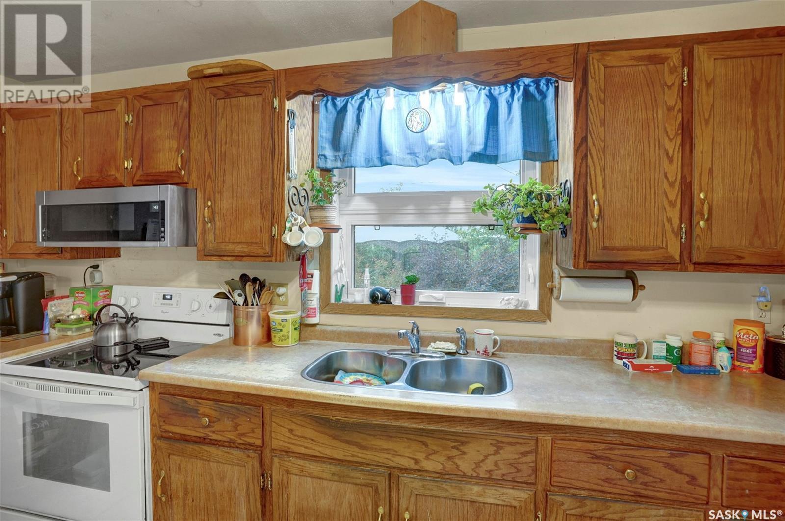 41 Main Street, Tuxford, SK - Indoor Photo Showing Kitchen With Double Sink