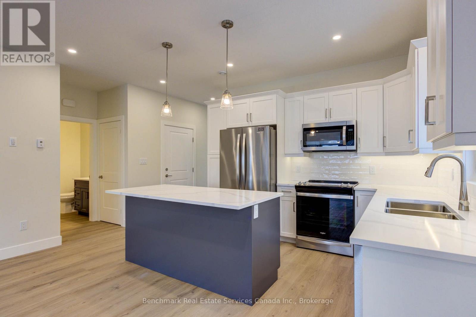 63 Cavalier Crescent, Huron-Kinloss, ON - Indoor Photo Showing Kitchen With Double Sink With Upgraded Kitchen