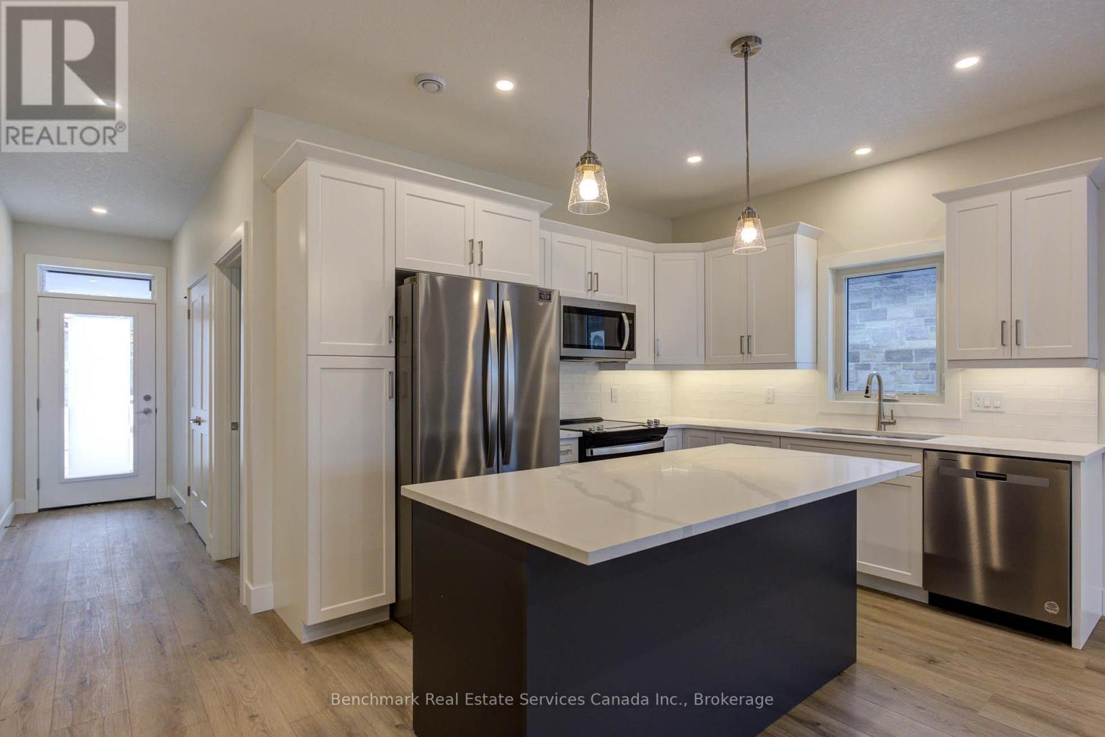 63 Cavalier Crescent, Huron-Kinloss, ON - Indoor Photo Showing Kitchen With Upgraded Kitchen