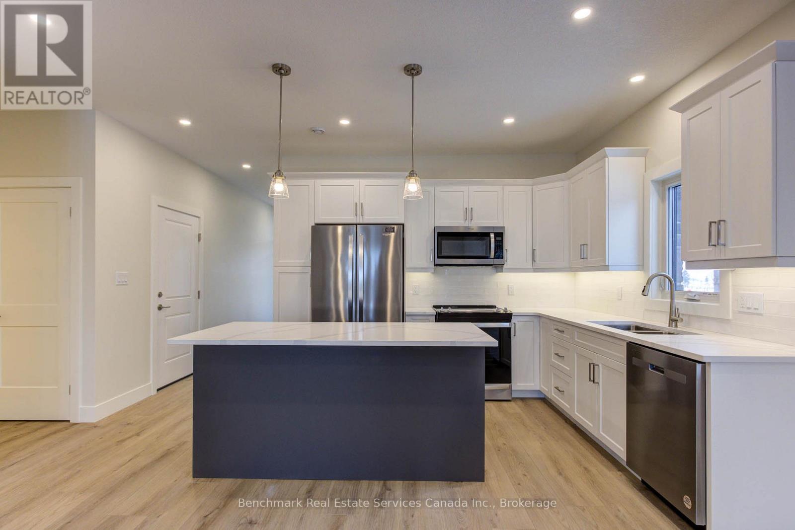 63 Cavalier Crescent, Huron-Kinloss, ON - Indoor Photo Showing Kitchen With Double Sink With Upgraded Kitchen