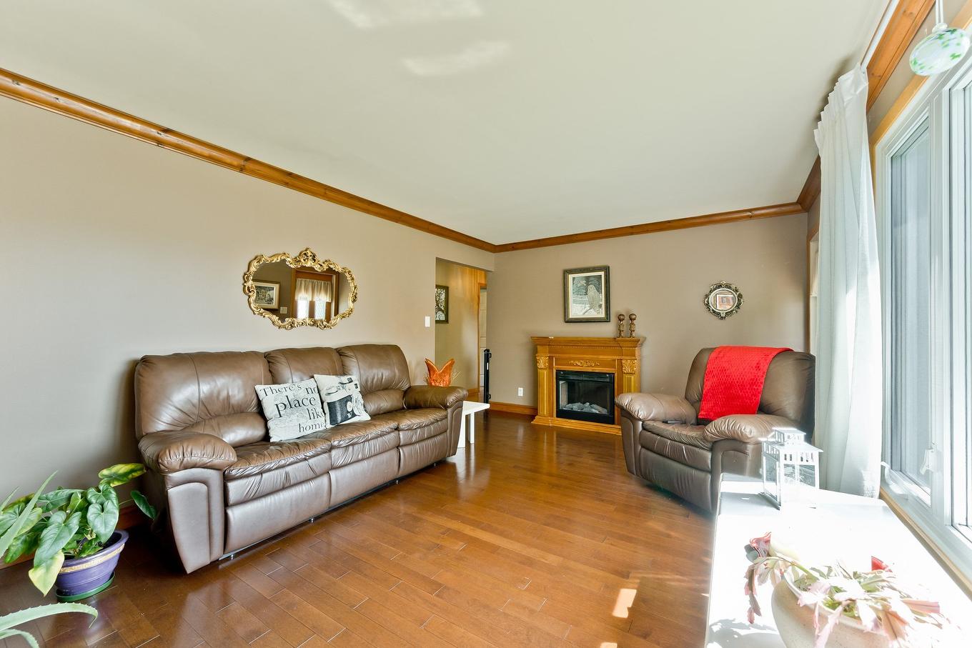 Living room - 3310 Rue Galt O., Sherbrooke (Les Nations), QC - Indoor Photo Showing Living Room With Fireplace
