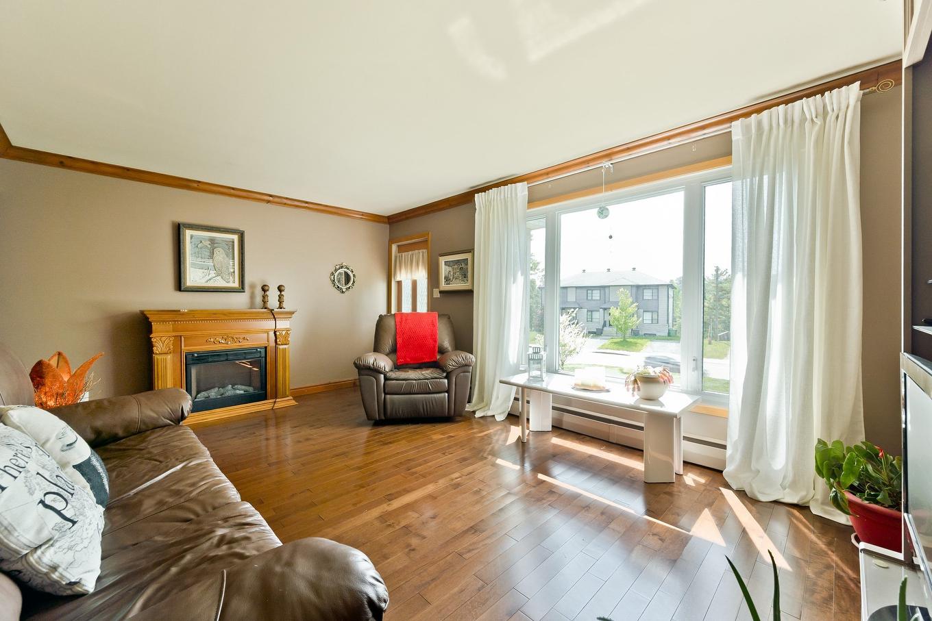 Living room - 3310 Rue Galt O., Sherbrooke (Les Nations), QC - Indoor Photo Showing Living Room With Fireplace