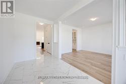 Front Hall with Upgraded Floors O/L Dining Room -