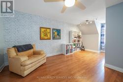 Bedroom with hardwood flooring -