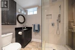 Lower level washroom beside sauna -