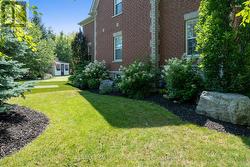 Perenial gardens and rich grass -