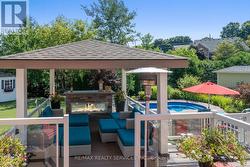 More upgrades - outdoor fireplace + gazebo -