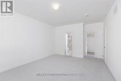 Primary Bedroom with Broadloom Floors -