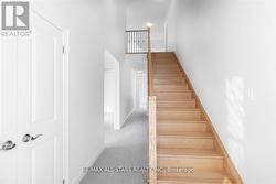 Upgraded Oak Stairs and Railing to Loft -