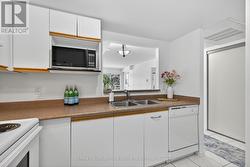 Kitchen Opens to Living Area -