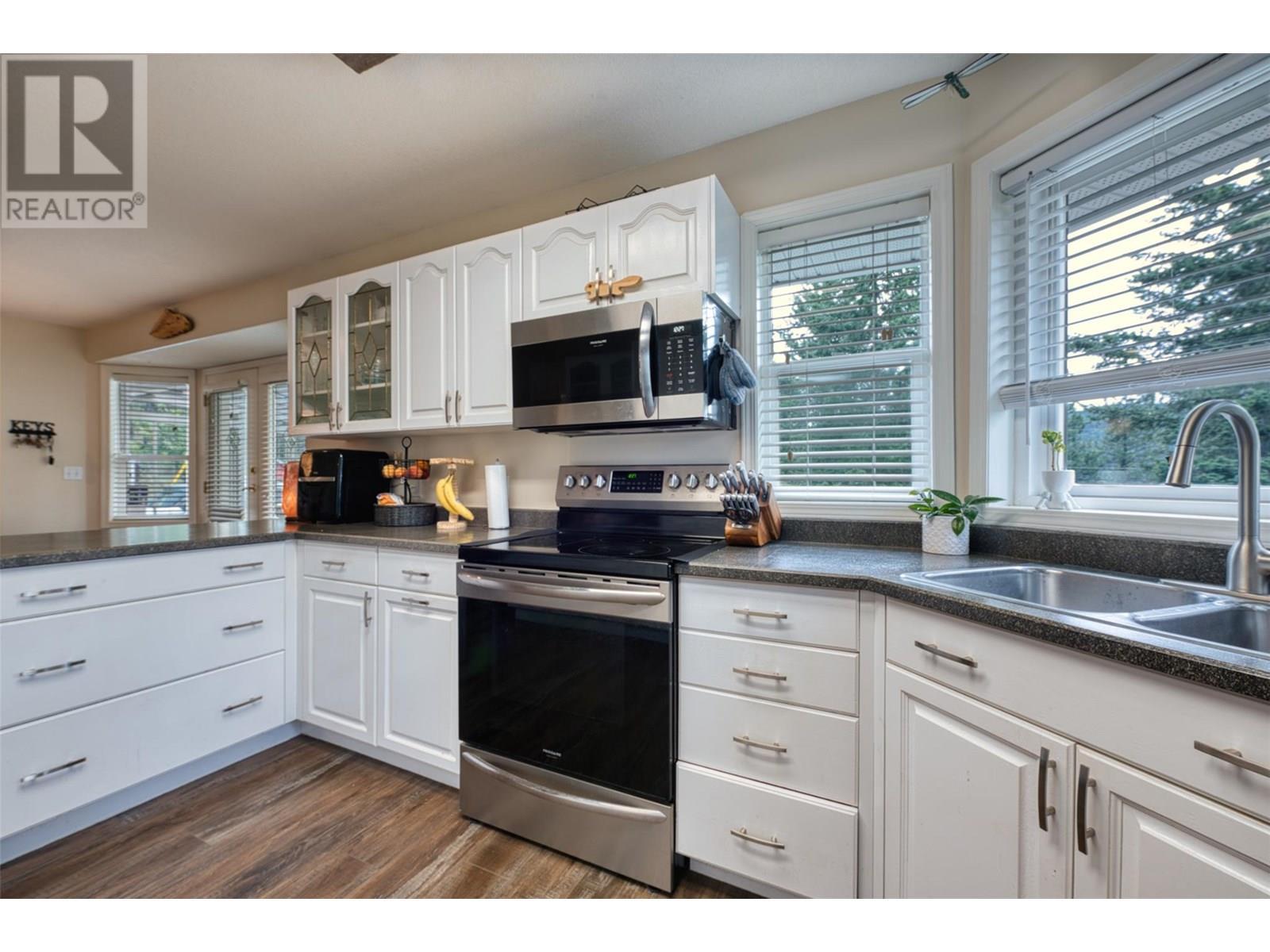 90 Mcinnes Road, Lumby, BC - Indoor Photo Showing Kitchen With Double Sink