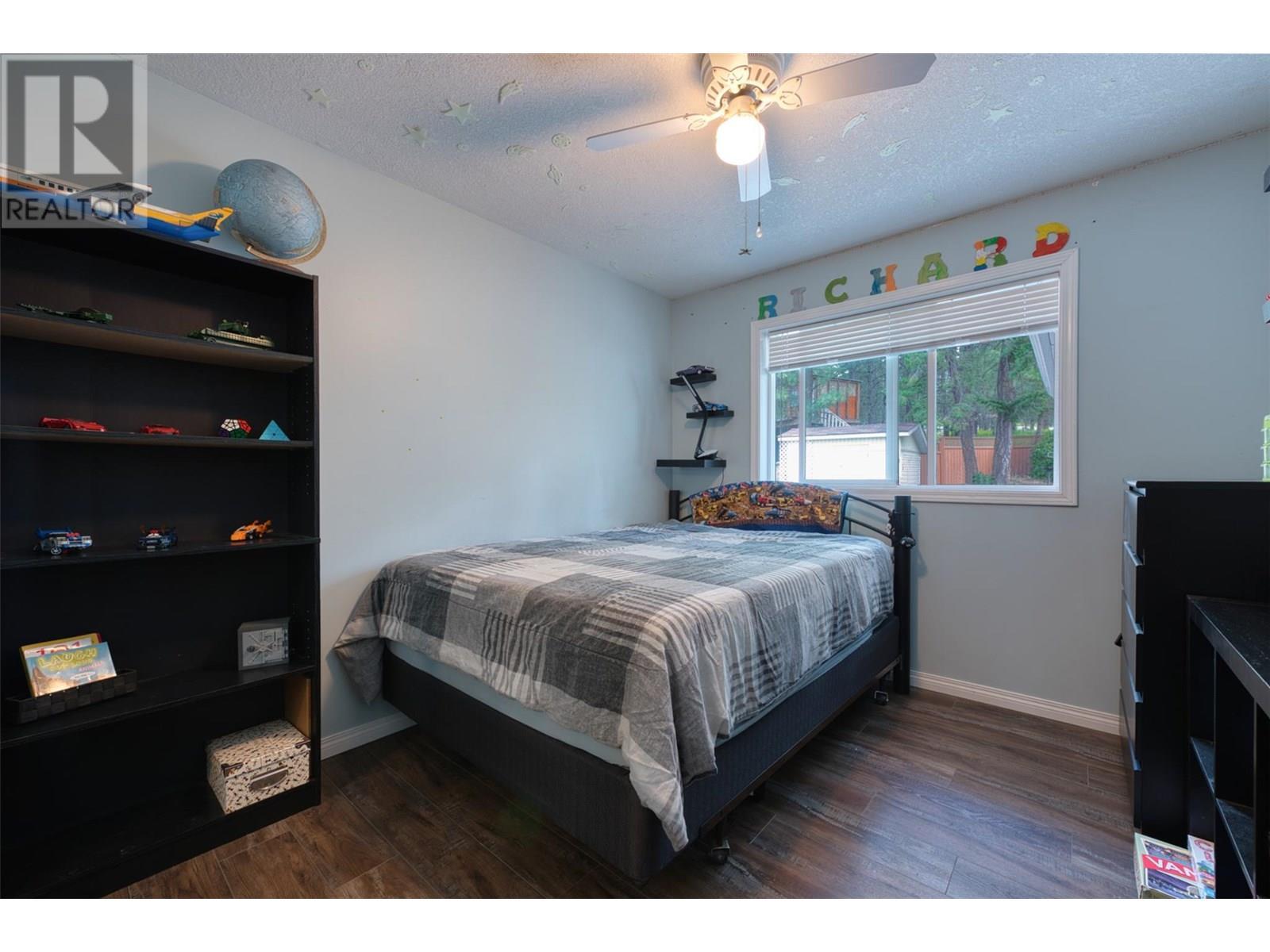 90 Mcinnes Road, Lumby, BC - Indoor Photo Showing Bedroom