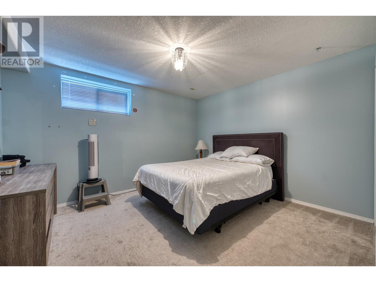 90 Mcinnes Road, Lumby, BC - Indoor Photo Showing Bedroom