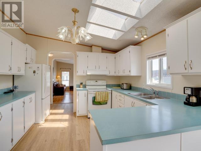 201-7575 Duncan Street, Powell River, BC - Indoor Photo Showing Kitchen With Double Sink