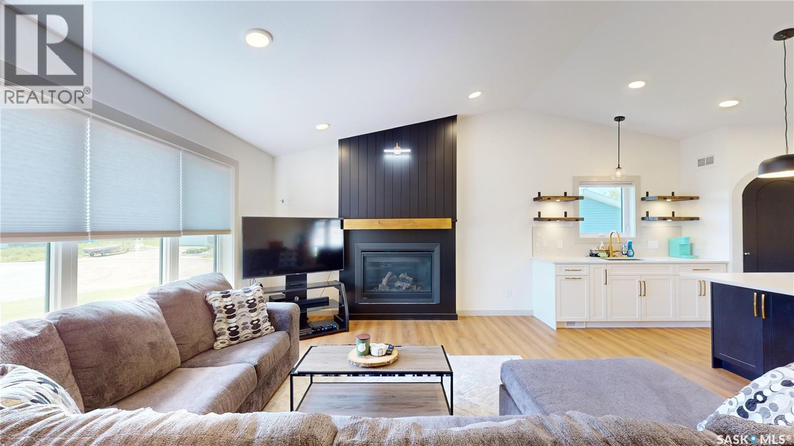 209 Willow Crescent, Waldheim, SK - Indoor Photo Showing Living Room With Fireplace