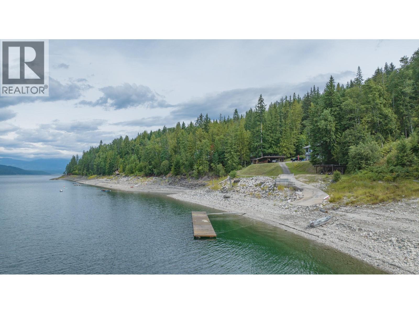 1710 6 Highway, Nakusp, BC - Outdoor With Body Of Water With View