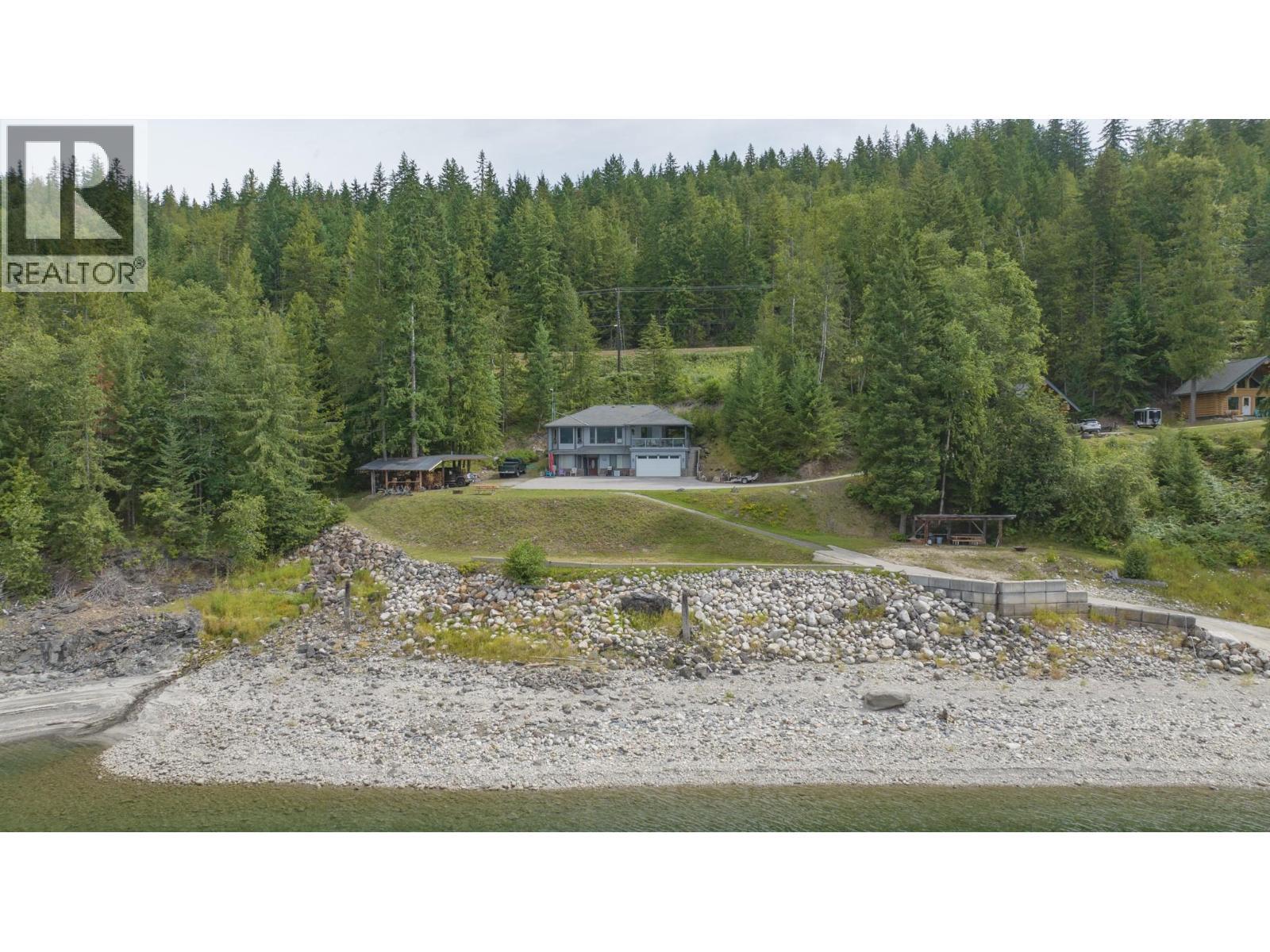 1710 6 Highway, Nakusp, BC - Outdoor With Body Of Water With View