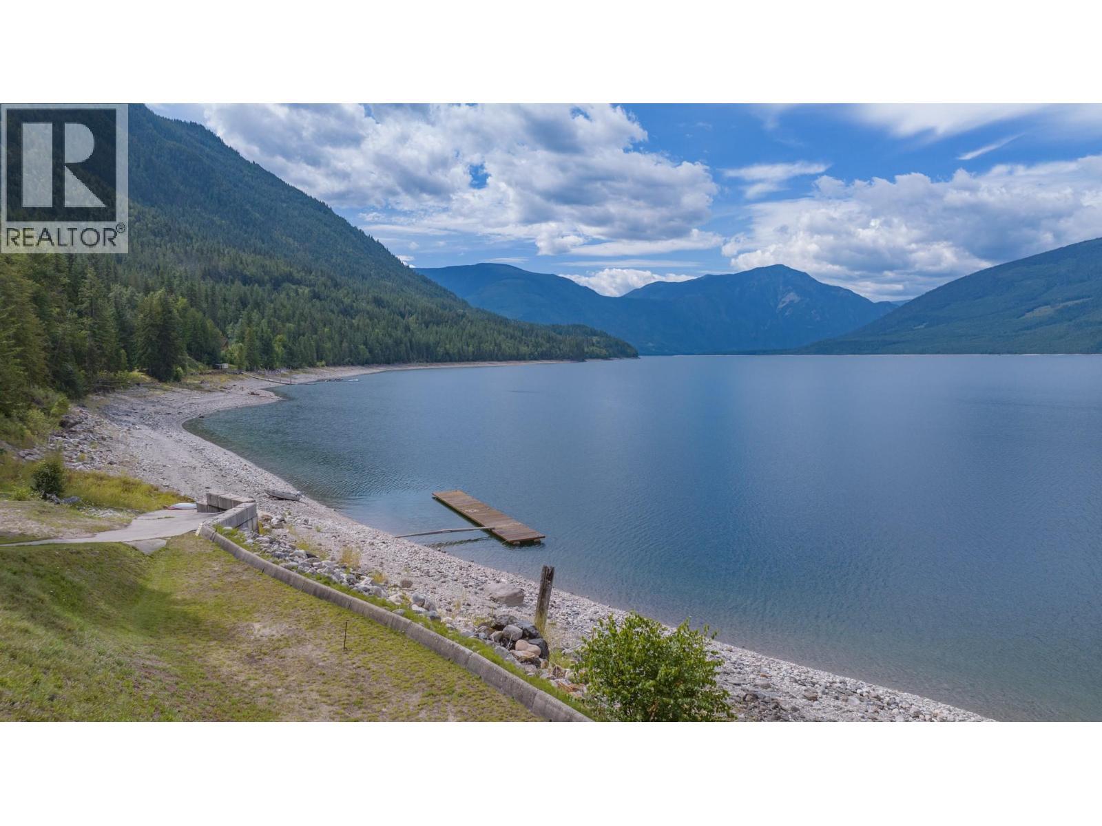 1710 6 Highway, Nakusp, BC - Outdoor With Body Of Water With View