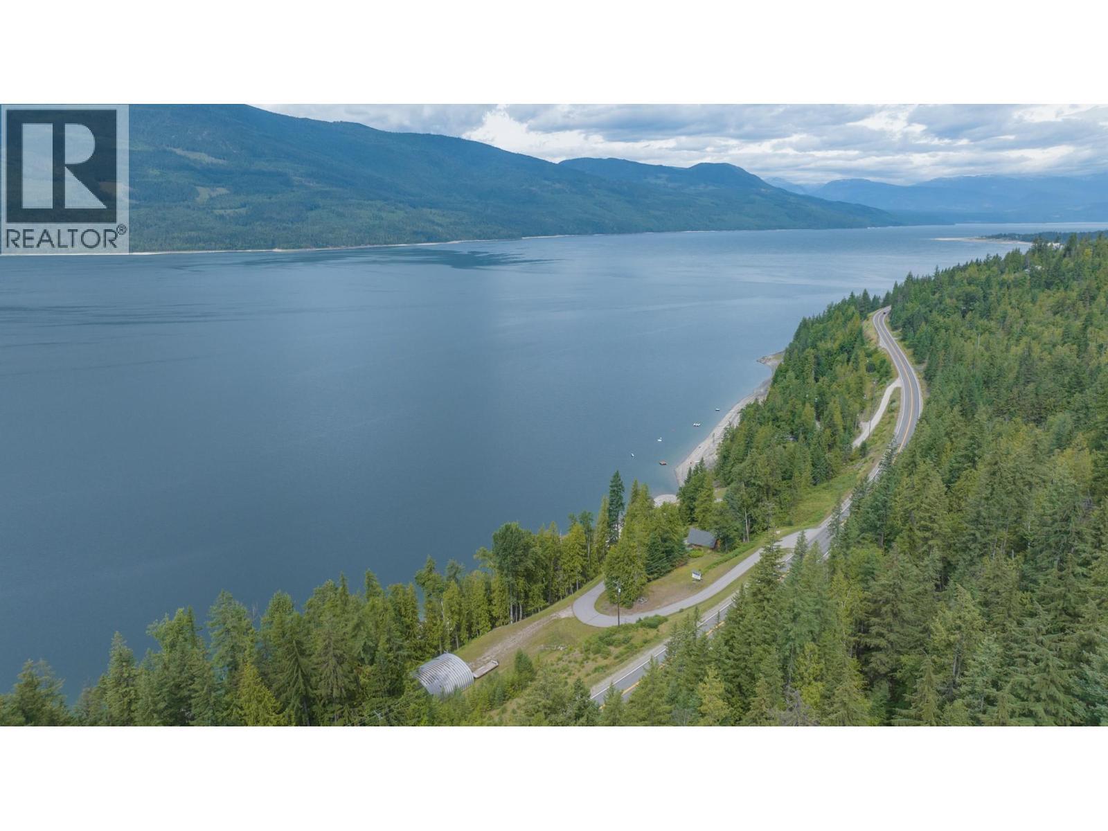 1710 6 Highway, Nakusp, BC - Outdoor With Body Of Water With View