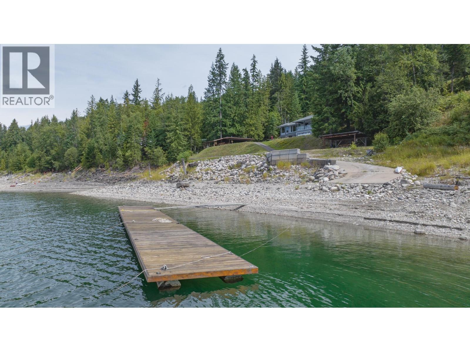 1710 6 Highway, Nakusp, BC - Outdoor With Body Of Water With View