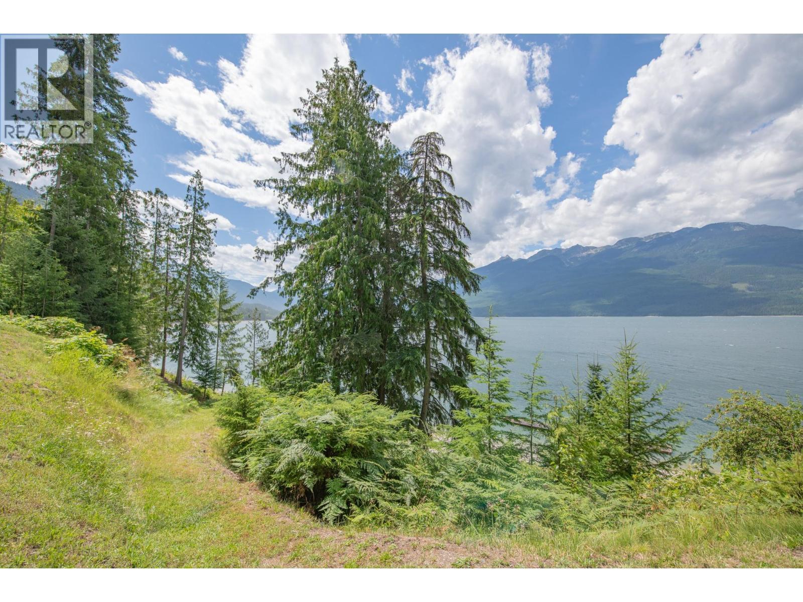 1710 6 Highway, Nakusp, BC - Outdoor With Body Of Water With View