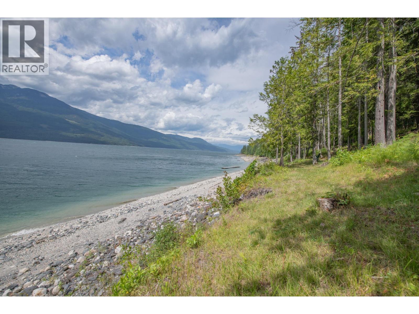 1710 6 Highway, Nakusp, BC - Outdoor With Body Of Water With View