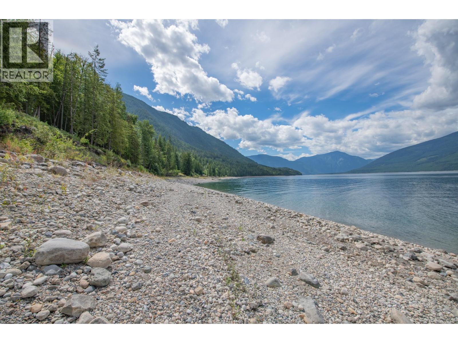 1710 6 Highway, Nakusp, BC - Outdoor With Body Of Water With View