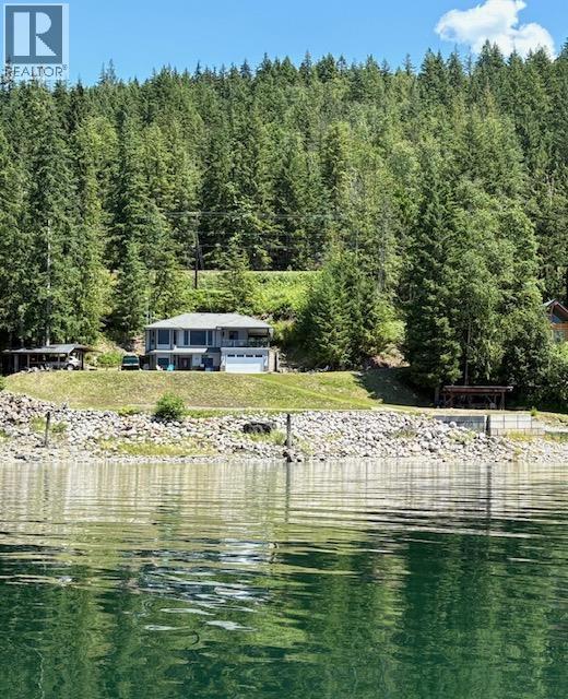 1710 6 Highway, Nakusp, BC - Outdoor With Body Of Water With View