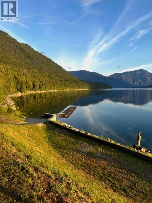 1710 6 Highway, Nakusp, BC - Outdoor With Body Of Water With View