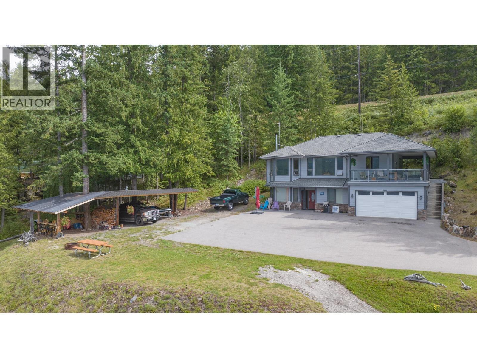 Main Home with separate suite - 1710 6 Highway, Nakusp, BC - Outdoor With Deck Patio Veranda