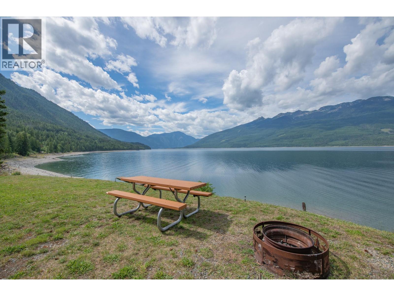 1710 6 Highway, Nakusp, BC - Outdoor With Body Of Water With View