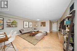 Great room looking at kitchen - virtually staged -