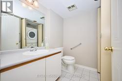 Guest bathroom with laundry -