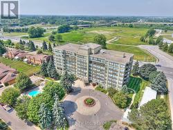 Aerial view of entrance and pool area -