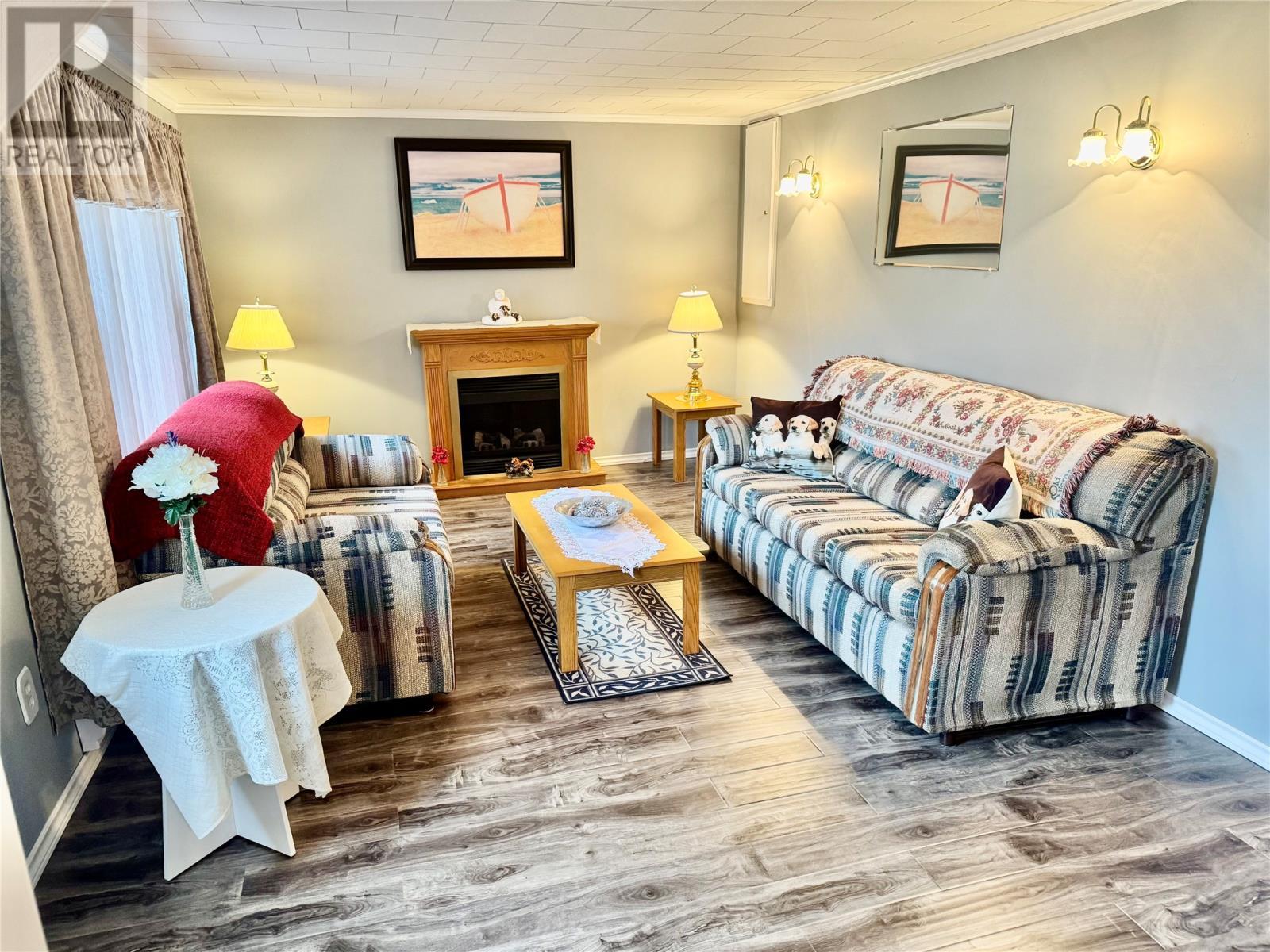 34A Main Road, Point La Haye, NL - Indoor Photo Showing Living Room With Fireplace