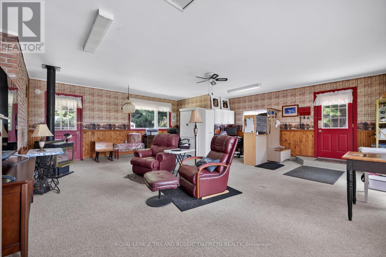 GARAGE CONVERSION TO RECREATION AREA - 6186 Egremont Drive, Middlesex Centre, ON - Indoor