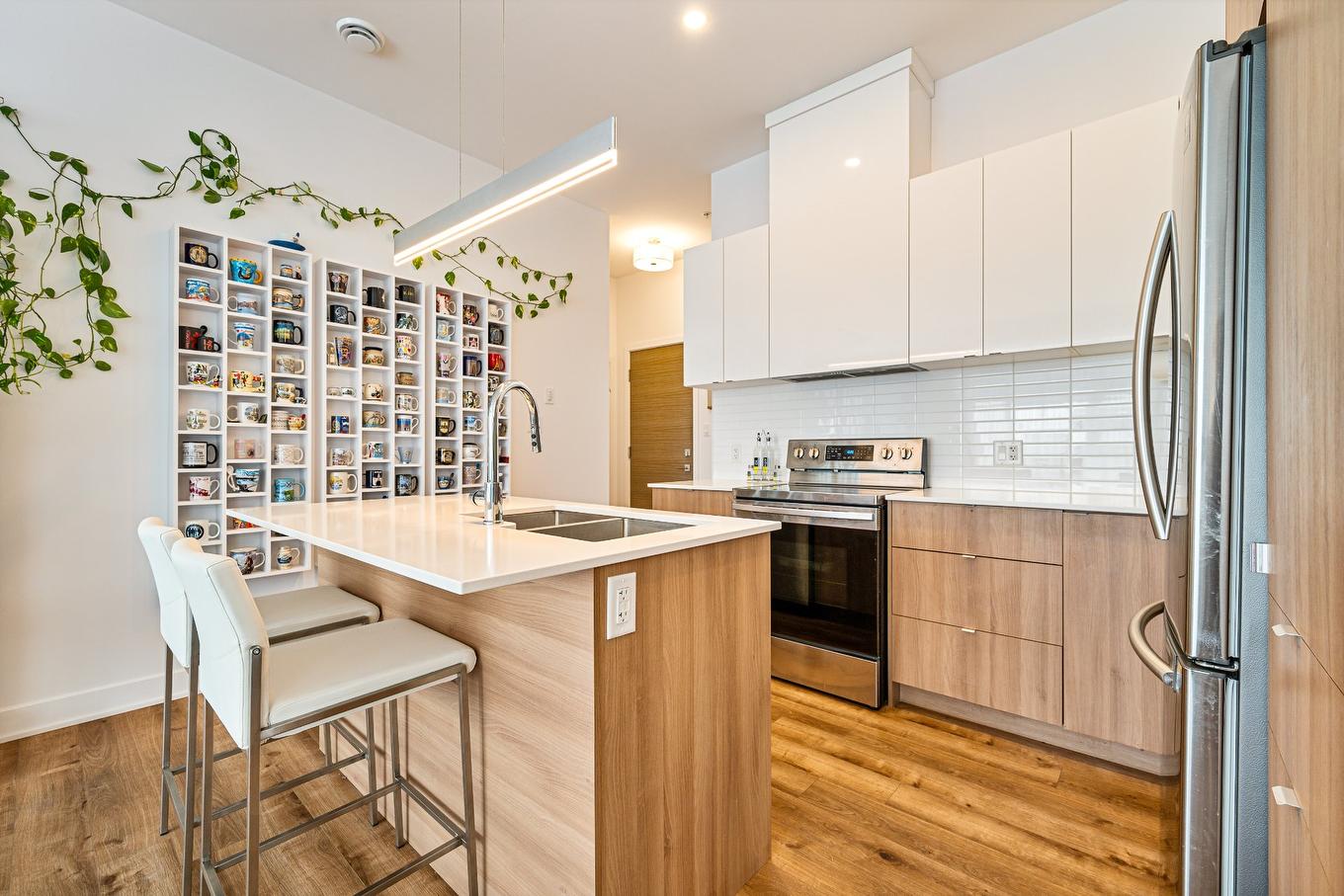 Kitchen - 404-191 Rue De Langloiserie, Rosemère, QC - Indoor Photo Showing Kitchen With Double Sink With Upgraded Kitchen