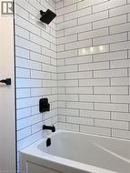 Full bathroom featuring shower / bath combination -