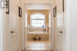 HIS AND HERS WALK-IN CLOSETS. -