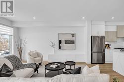 Bright living area off kitchen -