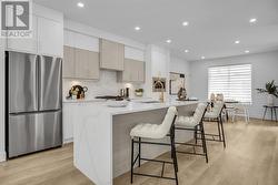 Spacious kitchen on main floor with waterfall island -