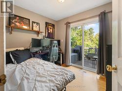 3rd bedroom with patio door -