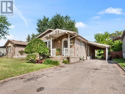 Front view with carport -