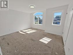 Spacious 2nd bedroom. Carpet to be installed soon. -