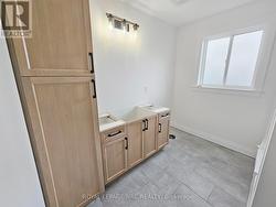 2nd Floor Bathroom. Countertops installed soon. -