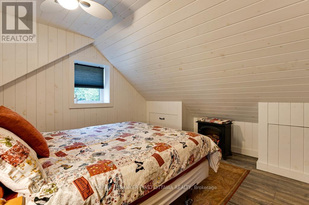 1169 Mosque Lake Road, Frontenac (Frontenac North), ON - Indoor Photo Showing Bedroom