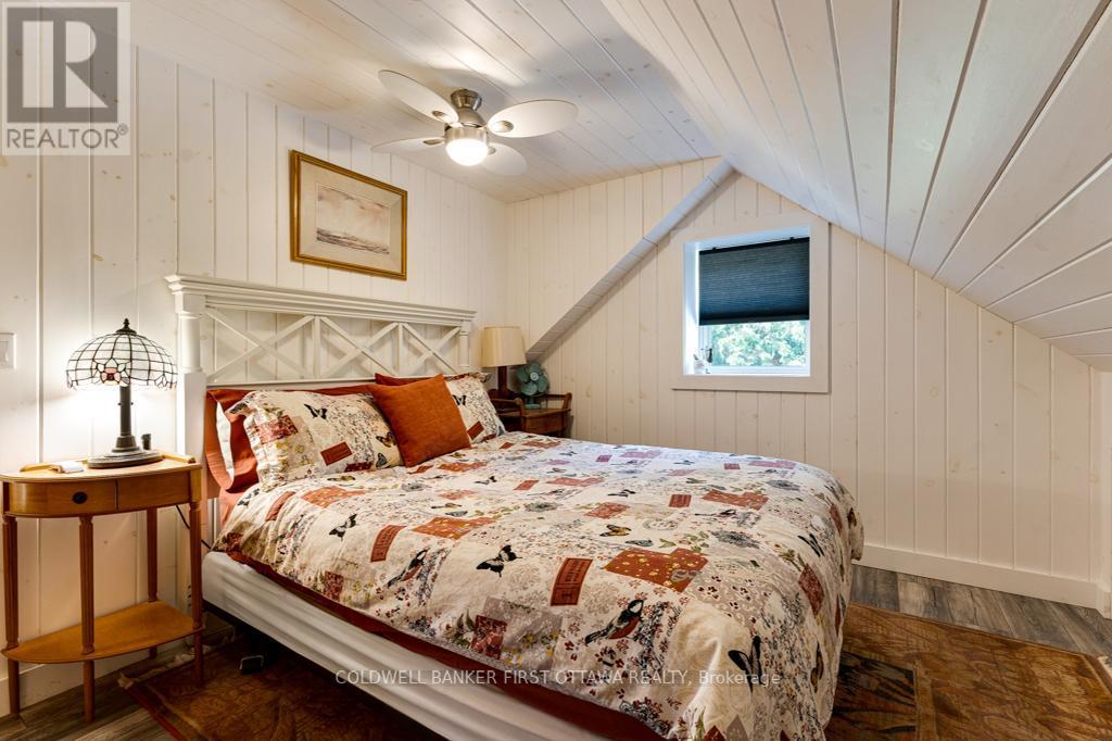1169 Mosque Lake Road, Frontenac (Frontenac North), ON - Indoor Photo Showing Bedroom
