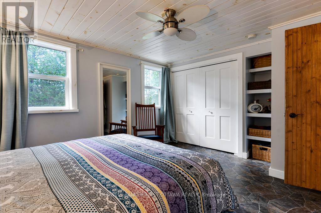 1169 Mosque Lake Road, Frontenac (Frontenac North), ON - Indoor Photo Showing Bedroom