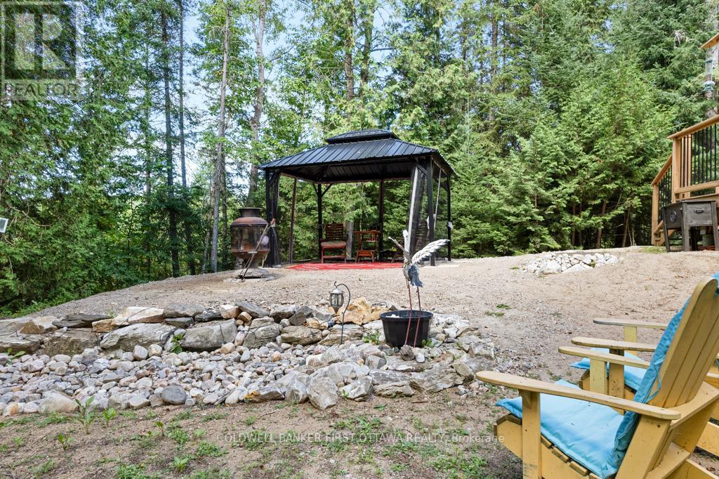 1169 Mosque Lake Road, Frontenac (Frontenac North), ON - Outdoor With Backyard
